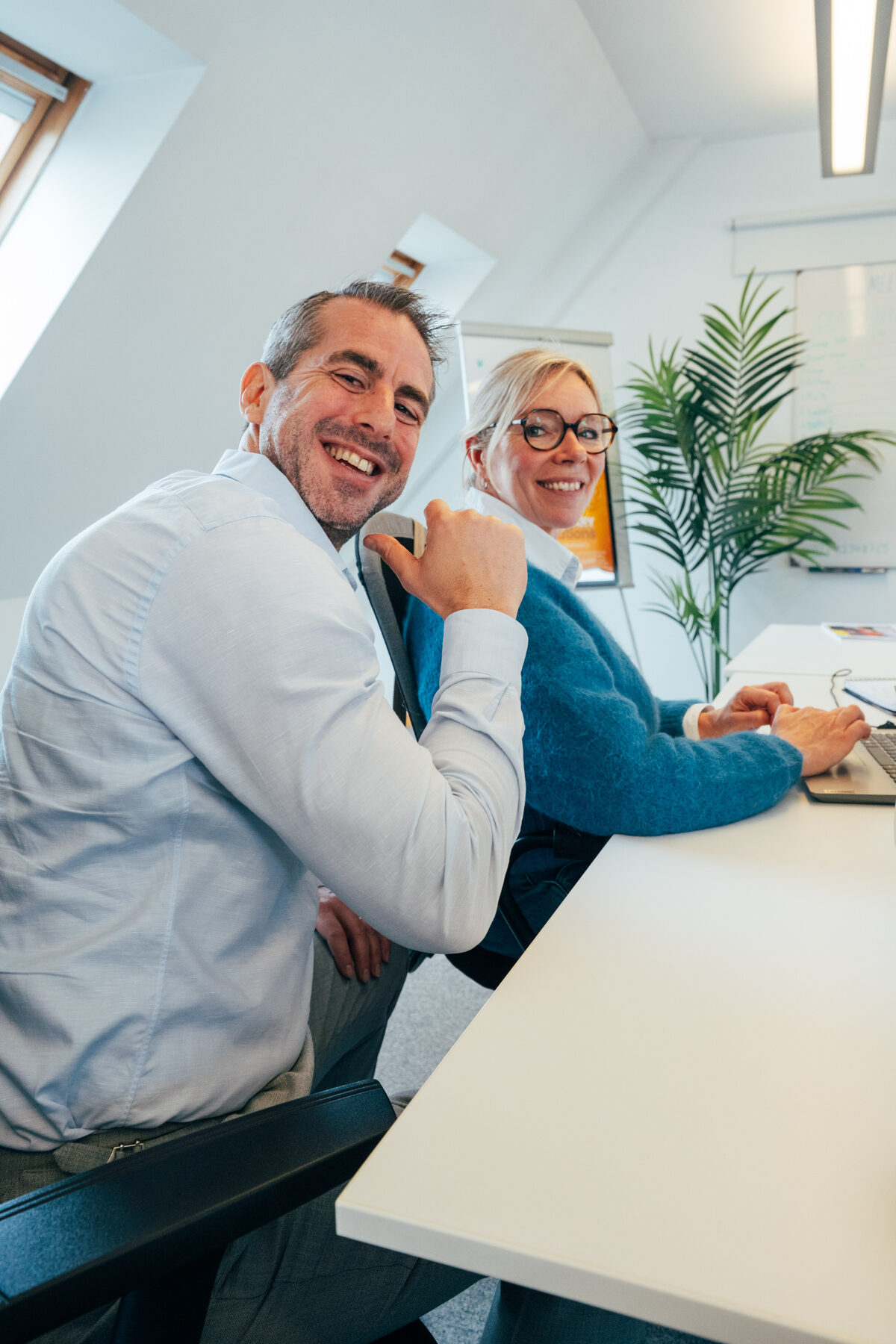 A consultant and a candidate talking in the Generations office